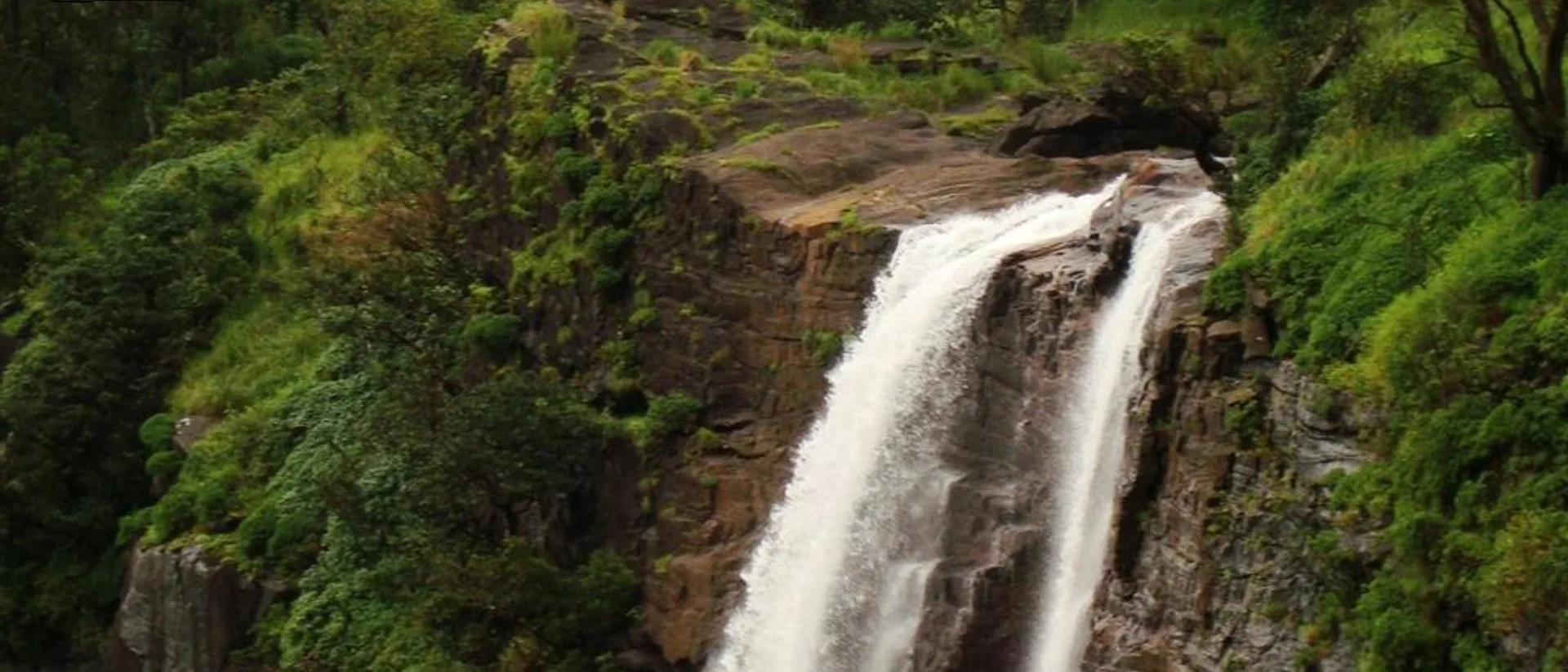 Bandaje Arbi Falls dropping through the Charmadi Ghat forest