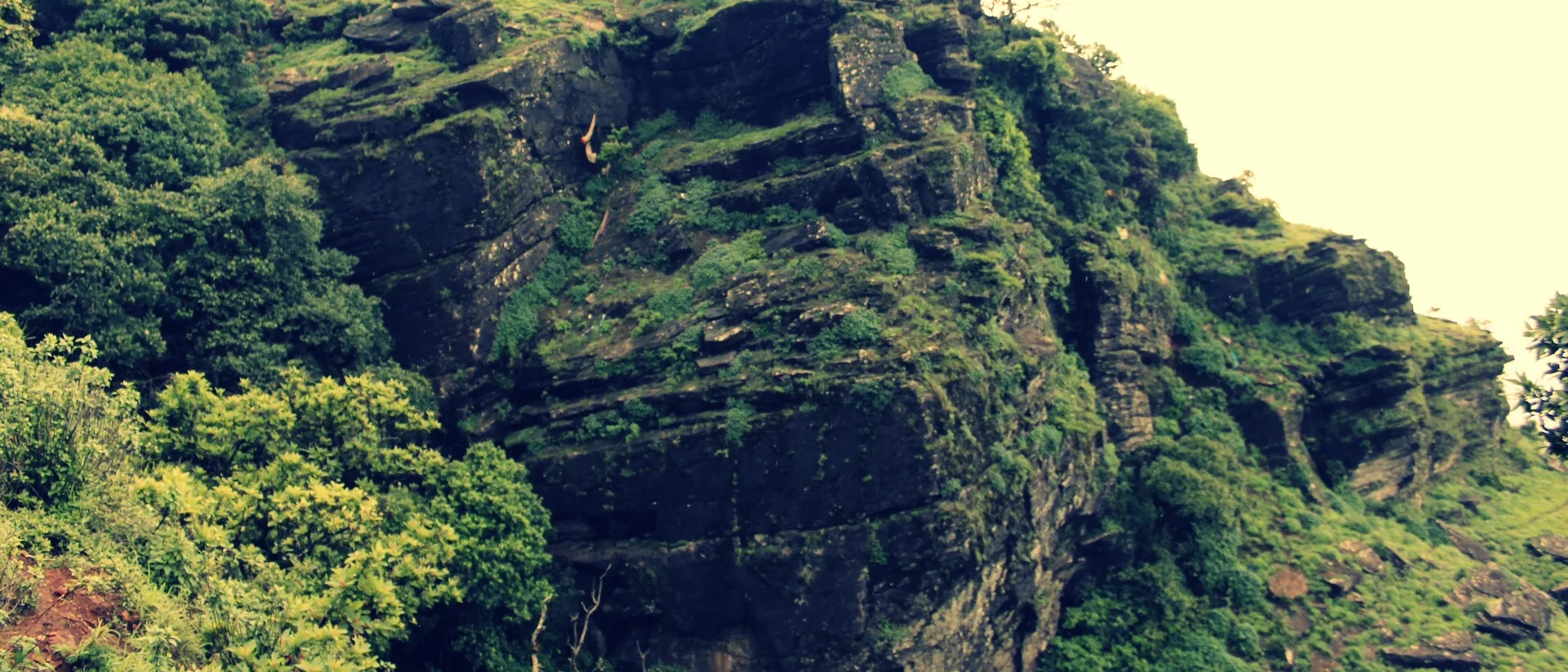 The rocky viewpoint above Manikyadhara Falls
